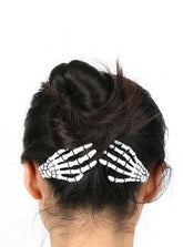 1 par de accesorios para el cabello de moda con forma de calavera y garras de esqueleto.